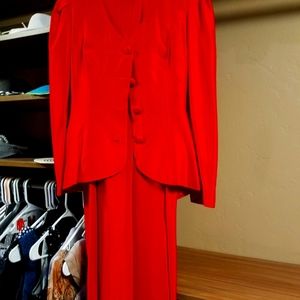 Formal Dress.  Jacket with peekaboo back, two bows and peplum plus long skirt.